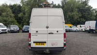 USED 2021 21 VOLKSWAGEN CRAFTER Trendline MWB High Roof CR35 Tdi 102 PS With Air Conditioning, Electric Windows, Parking Sensors, Criose control, Internal racking, Roof Rack and Side Loading door in great condition. 1 Owner from new - 4 Service stamps in the book . This is a genuine commercial opportunity to acquire a highly specified 21 plate Volkswagen Crafter Trendline in medium wheelbase, high roof configuration. Finished in a professional commercial colour, this van presents in great condition throughout and offers an exceptional specification list that is rarely found in a single vehicle at this price point.  The factory-fitted Trendline trim elevates this Crafter well beyond a standard workhorse. Air conditioning ensures cabin comfort during long shifts or warm weather, while electric windows and cruise control make motorway miles effortless and relaxed. The inclusion of front and rear parking sensors takes the stress out of tight urban manoeuvres, protecting both your vehicle and those around you.  This particular van has been carefully specified for immediate productive use. It benefits from professionally installed internal racking, providing secure and organised storage for tools, equipment, or stock. A robust roof rack adds further load-carrying flexibility, while the side loading door offers excellent accessibility for urban deliveries or site work where rear access is restricted. The combination of these features means this Crafter is ready to earn its keep from day one.  Under the bonnet lies the proven 2.0-litre TDI engine producing 102 PS, delivering dependable and efficient performance suited to both city driving and longer hauls. The CR35 designation confirms a gross vehicle weight of 3.5 tonnes, keeping this van within standard car licence requirements while offering a substantial payload capacity.  The service history is a standout feature of this offering. Supplied new to just one owner from new, the vehicle has been meticulously maintained with four service stamps recorded in the service book. This consistent maintenance schedule provides genuine peace of mind and demonstrates the care this van has received throughout its life. The condition reflects this careful ownership, with the bodywork, cab interior, and load area all presenting very well for a working vehicle.  This Crafter represents an intelligent purchase for any sole trader, fleet operator, or business looking to expand or upgrade their commercial fleet. The high specification, factory options, and documented service history make this a van that stands apart from the average used commercial vehicle. It requires no immediate preparation and is ready to be driven away and put straight to work. Viewing is highly recommended to appreciate the condition and specification on offer. For further details, including a full walk-around video and service record verification, please contact the sales team directly. Competitive finance packages and part-exchange options are available. Do not delay, as a van of this calibre in this condition will not remain available for long. 