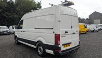 USED 2021 21 VOLKSWAGEN CRAFTER Trendline MWB High Roof CR35 Tdi 102 PS With Air Conditioning, Electric Windows, Parking Sensors, Criose control, Internal racking, Roof Rack and Side Loading door in great condition. 1 Owner from new - 4 Service stamps in the book . This is a genuine commercial opportunity to acquire a highly specified 21 plate Volkswagen Crafter Trendline in medium wheelbase, high roof configuration. Finished in a professional commercial colour, this van presents in great condition throughout and offers an exceptional specification list that is rarely found in a single vehicle at this price point.  The factory-fitted Trendline trim elevates this Crafter well beyond a standard workhorse. Air conditioning ensures cabin comfort during long shifts or warm weather, while electric windows and cruise control make motorway miles effortless and relaxed. The inclusion of front and rear parking sensors takes the stress out of tight urban manoeuvres, protecting both your vehicle and those around you.  This particular van has been carefully specified for immediate productive use. It benefits from professionally installed internal racking, providing secure and organised storage for tools, equipment, or stock. A robust roof rack adds further load-carrying flexibility, while the side loading door offers excellent accessibility for urban deliveries or site work where rear access is restricted. The combination of these features means this Crafter is ready to earn its keep from day one.  Under the bonnet lies the proven 2.0-litre TDI engine producing 102 PS, delivering dependable and efficient performance suited to both city driving and longer hauls. The CR35 designation confirms a gross vehicle weight of 3.5 tonnes, keeping this van within standard car licence requirements while offering a substantial payload capacity.  The service history is a standout feature of this offering. Supplied new to just one owner from new, the vehicle has been meticulously maintained with four service stamps recorded in the service book. This consistent maintenance schedule provides genuine peace of mind and demonstrates the care this van has received throughout its life. The condition reflects this careful ownership, with the bodywork, cab interior, and load area all presenting very well for a working vehicle.  This Crafter represents an intelligent purchase for any sole trader, fleet operator, or business looking to expand or upgrade their commercial fleet. The high specification, factory options, and documented service history make this a van that stands apart from the average used commercial vehicle. It requires no immediate preparation and is ready to be driven away and put straight to work. Viewing is highly recommended to appreciate the condition and specification on offer. For further details, including a full walk-around video and service record verification, please contact the sales team directly. Competitive finance packages and part-exchange options are available. Do not delay, as a van of this calibre in this condition will not remain available for long. 