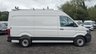 USED 2021 21 VOLKSWAGEN CRAFTER Trendline MWB High Roof CR35 Tdi 102 PS With Air Conditioning, Electric Windows, Parking Sensors, Criose control, Internal racking, Roof Rack and Side Loading door in great condition. 1 Owner from new - 4 Service stamps in the book . This is a genuine commercial opportunity to acquire a highly specified 21 plate Volkswagen Crafter Trendline in medium wheelbase, high roof configuration. Finished in a professional commercial colour, this van presents in great condition throughout and offers an exceptional specification list that is rarely found in a single vehicle at this price point.  The factory-fitted Trendline trim elevates this Crafter well beyond a standard workhorse. Air conditioning ensures cabin comfort during long shifts or warm weather, while electric windows and cruise control make motorway miles effortless and relaxed. The inclusion of front and rear parking sensors takes the stress out of tight urban manoeuvres, protecting both your vehicle and those around you.  This particular van has been carefully specified for immediate productive use. It benefits from professionally installed internal racking, providing secure and organised storage for tools, equipment, or stock. A robust roof rack adds further load-carrying flexibility, while the side loading door offers excellent accessibility for urban deliveries or site work where rear access is restricted. The combination of these features means this Crafter is ready to earn its keep from day one.  Under the bonnet lies the proven 2.0-litre TDI engine producing 102 PS, delivering dependable and efficient performance suited to both city driving and longer hauls. The CR35 designation confirms a gross vehicle weight of 3.5 tonnes, keeping this van within standard car licence requirements while offering a substantial payload capacity.  The service history is a standout feature of this offering. Supplied new to just one owner from new, the vehicle has been meticulously maintained with four service stamps recorded in the service book. This consistent maintenance schedule provides genuine peace of mind and demonstrates the care this van has received throughout its life. The condition reflects this careful ownership, with the bodywork, cab interior, and load area all presenting very well for a working vehicle.  This Crafter represents an intelligent purchase for any sole trader, fleet operator, or business looking to expand or upgrade their commercial fleet. The high specification, factory options, and documented service history make this a van that stands apart from the average used commercial vehicle. It requires no immediate preparation and is ready to be driven away and put straight to work. Viewing is highly recommended to appreciate the condition and specification on offer. For further details, including a full walk-around video and service record verification, please contact the sales team directly. Competitive finance packages and part-exchange options are available. Do not delay, as a van of this calibre in this condition will not remain available for long. 