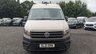 USED 2021 21 VOLKSWAGEN CRAFTER Trendline MWB High Roof CR35 Tdi 102 PS With Air Conditioning, Electric Windows, Parking Sensors, Criose control, Internal racking, Roof Rack and Side Loading door in great condition. 1 Owner from new - 4 Service stamps in the book . This is a genuine commercial opportunity to acquire a highly specified 21 plate Volkswagen Crafter Trendline in medium wheelbase, high roof configuration. Finished in a professional commercial colour, this van presents in great condition throughout and offers an exceptional specification list that is rarely found in a single vehicle at this price point.  The factory-fitted Trendline trim elevates this Crafter well beyond a standard workhorse. Air conditioning ensures cabin comfort during long shifts or warm weather, while electric windows and cruise control make motorway miles effortless and relaxed. The inclusion of front and rear parking sensors takes the stress out of tight urban manoeuvres, protecting both your vehicle and those around you.  This particular van has been carefully specified for immediate productive use. It benefits from professionally installed internal racking, providing secure and organised storage for tools, equipment, or stock. A robust roof rack adds further load-carrying flexibility, while the side loading door offers excellent accessibility for urban deliveries or site work where rear access is restricted. The combination of these features means this Crafter is ready to earn its keep from day one.  Under the bonnet lies the proven 2.0-litre TDI engine producing 102 PS, delivering dependable and efficient performance suited to both city driving and longer hauls. The CR35 designation confirms a gross vehicle weight of 3.5 tonnes, keeping this van within standard car licence requirements while offering a substantial payload capacity.  The service history is a standout feature of this offering. Supplied new to just one owner from new, the vehicle has been meticulously maintained with four service stamps recorded in the service book. This consistent maintenance schedule provides genuine peace of mind and demonstrates the care this van has received throughout its life. The condition reflects this careful ownership, with the bodywork, cab interior, and load area all presenting very well for a working vehicle.  This Crafter represents an intelligent purchase for any sole trader, fleet operator, or business looking to expand or upgrade their commercial fleet. The high specification, factory options, and documented service history make this a van that stands apart from the average used commercial vehicle. It requires no immediate preparation and is ready to be driven away and put straight to work. Viewing is highly recommended to appreciate the condition and specification on offer. For further details, including a full walk-around video and service record verification, please contact the sales team directly. Competitive finance packages and part-exchange options are available. Do not delay, as a van of this calibre in this condition will not remain available for long. 