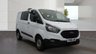 USED 2019 19 FORD TRANSIT CUSTOM Crew Van Double Cab L1 H1 Tdci 320 With Air Conditioning, Electric Windows, Rear Racking,  Hand wash etc, Bulkhead, Ply Lining, Reverse Camera, Speed Limiter, Parking Sensors, Cruise control in great condition . 1 Owner from New (Network Rail) - 2 Keys - 3 Services . This Ford Transit Custom Crew Van Double Cab L1 H1 Tdci 320 is presented in great condition and offers a rare opportunity to acquire a one owner example from new, having been previously operated by Network Rail. The vehicle is supplied with two original keys and has a comprehensive service record with three main dealer services.  The specification is particularly well suited to both commercial and passenger carrying duties, featuring the practical double cab configuration which provides seating for five occupants while retaining a generous load area. The L1 H1 body size offers excellent manoeuvrability for urban environments combined with ample cargo capacity.  Comfort and convenience are well catered for with factory fitted air conditioning and electric front windows, ensuring a pleasant environment for driver and passengers in all weather conditions. The inclusion of cruise control reduces driver fatigue on longer journeys, while the rear parking sensors and reverse camera make manoeuvring in tight spaces simple and safe.  The cargo area has been professionally prepared with full ply lining to protect the interior, along with substantial rear racking installed for secure storage of tools and equipment. A robust bulkhead separates the load area from the cabin for added safety and noise reduction. The vehicle has been meticulously maintained with a thorough hand wash and valet regime throughout its life.  Safety and security features include a speed limiter for compliance with fleet regulations, while the general condition of this Transit Custom reflects its careful ownership and regular maintenance schedule. This van is ready for immediate inspection and represents an excellent purchase for any business or individual requiring a versatile and dependable crew van. Viewing is highly recommended to appreciate the quality and specification of this exceptional vehicle. 