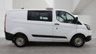 USED 2019 19 FORD TRANSIT CUSTOM Crew Van Double Cab L1 H1 Tdci 320 With Air Conditioning, Electric Windows, Rear Racking,  Hand wash etc, Bulkhead, Ply Lining, Reverse Camera, Speed Limiter, Parking Sensors, Cruise control in great condition . 1 Owner from New (Network Rail) - 2 Keys - 3 Services . This Ford Transit Custom Crew Van Double Cab L1 H1 Tdci 320 is presented in great condition and offers a rare opportunity to acquire a one owner example from new, having been previously operated by Network Rail. The vehicle is supplied with two original keys and has a comprehensive service record with three main dealer services.  The specification is particularly well suited to both commercial and passenger carrying duties, featuring the practical double cab configuration which provides seating for five occupants while retaining a generous load area. The L1 H1 body size offers excellent manoeuvrability for urban environments combined with ample cargo capacity.  Comfort and convenience are well catered for with factory fitted air conditioning and electric front windows, ensuring a pleasant environment for driver and passengers in all weather conditions. The inclusion of cruise control reduces driver fatigue on longer journeys, while the rear parking sensors and reverse camera make manoeuvring in tight spaces simple and safe.  The cargo area has been professionally prepared with full ply lining to protect the interior, along with substantial rear racking installed for secure storage of tools and equipment. A robust bulkhead separates the load area from the cabin for added safety and noise reduction. The vehicle has been meticulously maintained with a thorough hand wash and valet regime throughout its life.  Safety and security features include a speed limiter for compliance with fleet regulations, while the general condition of this Transit Custom reflects its careful ownership and regular maintenance schedule. This van is ready for immediate inspection and represents an excellent purchase for any business or individual requiring a versatile and dependable crew van. Viewing is highly recommended to appreciate the quality and specification of this exceptional vehicle. 