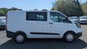 USED 2019 19 FORD TRANSIT CUSTOM Crew Van Double Cab L1 H1 Tdci 320 With Air Conditioning, Electric Windows, Rear Racking,  Hand wash etc, Bulkhead, Ply Lining, Reverse Camera, Speed Limiter, Parking Sensors, Cruise control in great condition . 1 Owner from New (Network Rail) - 2 Keys - 3 Services . This Ford Transit Custom Crew Van Double Cab L1 H1 Tdci 320 is presented in great condition and offers a rare opportunity to acquire a one owner example from new, having been previously operated by Network Rail. The vehicle is supplied with two original keys and has a comprehensive service record with three main dealer services.  The specification is particularly well suited to both commercial and passenger carrying duties, featuring the practical double cab configuration which provides seating for five occupants while retaining a generous load area. The L1 H1 body size offers excellent manoeuvrability for urban environments combined with ample cargo capacity.  Comfort and convenience are well catered for with factory fitted air conditioning and electric front windows, ensuring a pleasant environment for driver and passengers in all weather conditions. The inclusion of cruise control reduces driver fatigue on longer journeys, while the rear parking sensors and reverse camera make manoeuvring in tight spaces simple and safe.  The cargo area has been professionally prepared with full ply lining to protect the interior, along with substantial rear racking installed for secure storage of tools and equipment. A robust bulkhead separates the load area from the cabin for added safety and noise reduction. The vehicle has been meticulously maintained with a thorough hand wash and valet regime throughout its life.  Safety and security features include a speed limiter for compliance with fleet regulations, while the general condition of this Transit Custom reflects its careful ownership and regular maintenance schedule. This van is ready for immediate inspection and represents an excellent purchase for any business or individual requiring a versatile and dependable crew van. Viewing is highly recommended to appreciate the quality and specification of this exceptional vehicle. 