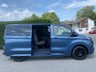 USED 2024 74 FORD TRANSIT CUSTOM  320 LIMITED DCIV 6 SEATER CREWVAN L1 2.0 ECOBLUE 136PS CHROME BLUE  EX SCS Company Vehicle With Only Only 7,852 Miles, Ford Warranty Till December 2027, Popular High Specification Limited Model With Lots Of Upgrades Inc Big Wheels, Side Bars Rear Spoiler & Lots More