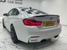 USED 2019 19 BMW M4 3.0 BiTurbo Competition Coupe 2dr Petrol DCT Euro 6 (s/s) (450 ps) Finished In Mineral White, This M4 Comes With Superb Spec, Such As Adaptive LED Headlights, Ghost Immobiliser, Genuine Carbon BMW Rear Spoiler,  Heads Up Display, Memory Seats, Reversing Assistant Camera, Full BMW Service History, Interior Carbon Fibre Trim Finisher, Surround View, Harman Kardon Premium Sound System, Speed Limit Display, High Beam Assistant, Extended Storage, Sun Protection Glazing, M4 Debossed Logo, Heated Electric Front Seats, 12 Months MOT, 3 Months Warranty. Finance And Exte
