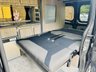 USED 2014 14 RENAULT TRAFIC 2.0 dCi SL27 Sport Panel Van 3dr Diesel Manual L1 H1 (198 g/km, 115 bhp) Here we have a lovely low mileage affordable example of a 4 berth professionally converted campervan, finished in metallic black. We converted this van around 2 years ago and last owner has slept in it less tan half a dozen times. Kiravan tested double front swivel, so giving it 5 belted traveling seats, Smev sink and hob, Victron charging system, Rear Bike rack. interion was fully retrimmed in a stunning factory looking grey and blue colours. C AND H Pop top fitted.