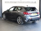 USED 2020 20 BMW 1 SERIES 2.0 M135i Hatchback 5dr Petrol Auto xDrive Euro 6 (s/s) (306 ps) VIRTUAL COCKPIT DIGITAL DASH DISPLAY + SATELLITE NAVIGATION + APPLE CARPLAY / APPS CONTROL + ENHANCED BLUETOOTH PHONE PREPARATION WITH USB AUDIO INTERFACE AND VOICE CONTROL + DAB DIGITAL RADIO + DUAL ZONE CLIMATE CONTROL + AIR CONDITIONING + AUTOMATIC LED HEADLIGHTS + FRONT AND REAR PARKING SENSORS + KEYLESS START + HILL HOLD START ASSIST + SELECTABLE DRIVING MODES + IN CAR ENTERTAINMENT WITH TOUCH SCREEN MEDIA DISPLAY + LEATHER MULTI FUNCTIONAL STEERING WHEEL WITH PADDLE SHIFT GEAR SELECT