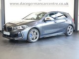 USED 2020 20 BMW 1 SERIES 2.0 M135i Hatchback 5dr Petrol Auto xDrive Euro 6 (s/s) (306 ps) VIRTUAL COCKPIT DIGITAL DASH DISPLAY + SATELLITE NAVIGATION + APPLE CARPLAY / APPS CONTROL + ENHANCED BLUETOOTH PHONE PREPARATION WITH USB AUDIO INTERFACE AND VOICE CONTROL + DAB DIGITAL RADIO + DUAL ZONE CLIMATE CONTROL + AIR CONDITIONING + AUTOMATIC LED HEADLIGHTS + FRONT AND REAR PARKING SENSORS + KEYLESS START + HILL HOLD START ASSIST + SELECTABLE DRIVING MODES + IN CAR ENTERTAINMENT WITH TOUCH SCREEN MEDIA DISPLAY + LEATHER MULTI FUNCTIONAL STEERING WHEEL WITH PADDLE SHIFT GEAR SELECT