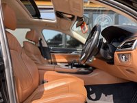 USED 2016 65 BMW 7 SERIES 3.0 740Li Saloon 4dr Petrol Auto Euro 6 (s/s) (326 ps) Gleaming Black metallic with Cognac leather interior, G12 CARBON CORE, BMW Gesture control, park assistant, surround view, DAB radio, auto high beam assist, LED fog lights, 4 zone climate control, heated front and rear seats, electric memory comfort front seats with ventilation, electric comfort rear seats with memory, massage function for front seats, twin electric sunroofs, rear sunblinds, surround and rear camera, Park Assist system, BMW dispaly key, soft close doors, keyless entry an