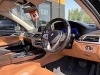 USED 2016 65 BMW 7 SERIES 3.0 740Li Saloon 4dr Petrol Auto Euro 6 (s/s) (326 ps) Gleaming Black metallic with Cognac leather interior, G12 CARBON CORE, BMW Gesture control, park assistant, surround view, DAB radio, auto high beam assist, LED fog lights, 4 zone climate control, heated front and rear seats, electric memory comfort front seats with ventilation, electric comfort rear seats with memory, massage function for front seats, twin electric sunroofs, rear sunblinds, surround and rear camera, Park Assist system, BMW dispaly key, soft close doors, keyless entry an
