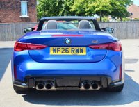 PRE-OWNED 2026 26 BMW M4 3.0 BiTurbo Competition Convertible 2dr Petrol Steptronic M xDrive Euro 6 (s/s) (530 ps) Portimao Blue Metallic (&pound;875 option), Merino Bicolour Leather Silverstone/Black (&pound;2000 option), 19" Front 20" Rear Alloy Wheels M Double Spoke 826 Forged Bi Colour Alloys, Technology Package (&pound;2675 option), Heated Steering Wheel (&pound;250 option), High Beam Assistant (&pound;&pound;175 option), M Brakes With Red Callipers (&pound;325 option), BMW Live Cockpit With Head-Up Display, Electric Folding Mirrors, Heated Seats, Harman Kardon Music System, Cruise Control, Electric Memory Seats, Smartphone Integration, Adaptiv