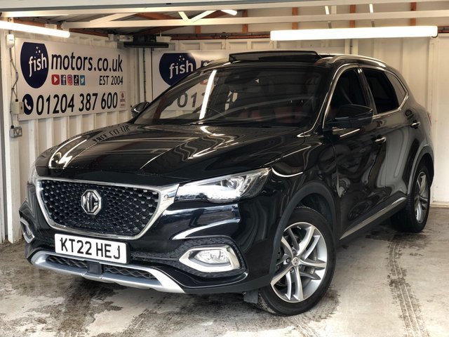 2022 22 MG MG HS 1.5 T-GDI 16.6kWh Exclusive SUV 5dr Petrol Plug-in Hybrid Auto Euro 6 (s/s) (258 ps)+2 KEYS+FSH+1 FORMER KEEPER+CAMERA+NAV+BLACK&RED FULL LEATHER HEATED SEATS+PANORAMIC SUNROOF+BLUETOOTH+MEDIA+UPGRADED SOUND SYSTEM+ALLOYS+CRUISE+PARKING SENSORS+ 2 KEYS+FSH+1 FORMER KEEPER+CAMERA+NAV+BLACK&RED FULL LEATHER HEATED SEATS+PANORAMIC SUNROOF+BLUETOOTH+MEDIA+UPGRADED SOUND SYSTEM+ALLOYS+CRUISE+PARKING SENSORS+HPI CLEAR