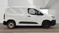 USED 2023 23 CITROEN BERLINGO Enterprise Edition M Blue HDi 100 PS 1000 With Air Conditioning, Electric Pack, 3 Seat Cab, Bulkhead Ply Lining, Andriod Auto / Apple Car Play , Parking sensors in great condition . 1 Owner from new - 5 Service stamps in the book . this 23 Plate Citroen Berlingo Enterprise Edition represents a rare opportunity to acquire a highly specified, one-owner workhorse with a meticulously documented service history. Finished in a professional M Blue, this van has covered 98,906 miles, a figure that reflects consistent, regular use rather than punishing urban stop-start duty, and it has been maintained to an exemplary standard with no fewer than five service stamps recorded in the accompanying service book. This is not a van that has been passed between multiple drivers or left to deteriorate on a fleet; it has been cared for by a single proprietor who has clearly understood the value of preventative maintenance.  Under the bonnet lies the proven 1.5-litre Blue HDi 100 PS diesel engine, an exceptionally economical and reliable unit that delivers ample torque for fully laden runs while maintaining remarkable fuel efficiency for a vehicle of this size. The six-speed manual gearbox offers precise, positive shifts, and the driving position is commanding, affording excellent visibility for navigating tight city streets or busy motorways. The ride quality remains composed and planted, a testament to the van's well-maintained suspension, and the brakes provide confident, reassuring stopping power. This is a vehicle that drives as crisply as it looks, with no mechanical hesitancy or untoward noises to report.  The specification sheet is particularly impressive for a commercial vehicle in this sector. Air conditioning ensures a comfortable cabin environment irrespective of the outside temperature, while the comprehensive Electric Pack provides the convenience of electric windows and electrically adjustable door mirrors, making manoeuvring and daily use far more civilised. The three-seat cab configuration offers genuine flexibility, accommodating both driver and two passengers with ease, and the bulkhead ply lining is a robust, factory-fit addition that protects the cab from shifting cargo and reduces cabin noise significantly. Furthermore, the integrated infotainment system features both Android Auto and Apple CarPlay, allowing seamless smartphone integration for navigation, music, and hands-free communication, and the rear parking sensors make every reverse manoeuvre simple and stress-free.  The condition of this Berlingo Enterprise Edition is genuinely striking for its age and mileage. The bodywork presents immaculately, with straight panels, consistent paint finish, and no evidence of accident damage or corrosion. The commercial load area is equally impressive, having been clearly used with care and consideration, and the ply lining has protected the metalwork from scuffs and scrapes. The tyres retain plenty of tread, the alloy wheels are free from significant kerbing, and the overall impression is one of a van that has been driven with mechanical sympathy and stored with care.  This is the ideal choice for the independent tradesperson, the expanding business needing a reliable second vehicle, or the fleet manager seeking a cost-effective, high-specification addition to their lineup. The combination of a full service history, single ownership, and this level of factory equipment is exceptionally difficult to find at this mileage point. Do not delay in arranging a viewing, as a van of this calibre, with such comprehensive provenance and specification, will not remain available for long. 