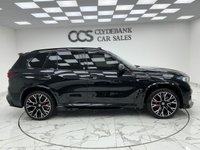 USED 2022 72 BMW X5 M 4.4i V8 Competition SUV 5dr Petrol Auto xDrive Euro 6 (s/s) (625 ps) Finished In Black Sapphire, This X5M Comes With The Comfort Plus Package Which Includes Four Zone Climate Control, Heated Rear Seats, Massage Seats & Soft Close Doors. The X5M Also Contains The Technology Plus Package That Comprises The Heads Up Display, Driving Assistant Pro & Parking Assistant Plus. Bowers And Wilkins Diamond Surround Sound System, Sky Lounge Glass Panoramic Roof, BMW Visibility Package, Heated And Cooled Memory Seats, 2 Keys, Service History, 12 Months MOT, 3 Months Warranty.