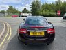USED 2010 10 JAGUAR XK 5.0 V8 Portfolio Coupe 2dr Petrol Auto Euro 5 (385 ps)-Superb Low Mileage Example-Finished In Rare Caviar Metallic-Heated Ivory Leather Upholstery.11 Services On File.The Very Best. 