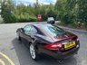 USED 2010 10 JAGUAR XK 5.0 V8 Portfolio Coupe 2dr Petrol Auto Euro 5 (385 ps)-Superb Low Mileage Example-Finished In Rare Caviar Metallic-Heated Ivory Leather Upholstery.11 Services On File.The Very Best. 