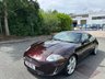 USED 2010 10 JAGUAR XK 5.0 V8 Portfolio Coupe 2dr Petrol Auto Euro 5 (385 ps)-Superb Low Mileage Example-Finished In Rare Caviar Metallic-Heated Ivory Leather Upholstery.11 Services On File.The Very Best. 