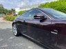 USED 2010 10 JAGUAR XK 5.0 V8 Portfolio Coupe 2dr Petrol Auto Euro 5 (385 ps)-Superb Low Mileage Example-Finished In Rare Caviar Metallic-Heated Ivory Leather Upholstery.11 Services On File.The Very Best. 