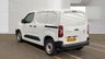 USED 2023 23 PEUGEOT PARTNER White 1.5 BlueHDi Professional Premium+ van, 64,000 miles, Euro 6, 6-Speed manual, CarPlay/Android Auto, 8in Screen, Rear sensors. Plus VAT @ 20%! This 2023 Peugeot Partner is a practical choice for your business needs, having been maintained by only one owner since new. This standard panel van is powered by a 1.5 litre BlueHDi diesel engine, which produces 102 bhp and meets Euro 6 emission standards. The vehicle comes with an MOT valid until April 2027, providing peace of mind for the road ahead. Inside the cabin, you will find an 8 inch capacitive colour touchscreen that includes DAB radio, Bluetooth handsfree connectivity, and a USB soc