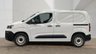 USED 2023 23 PEUGEOT PARTNER White 1.5 BlueHDi Professional Premium+ van, 64,000 miles, Euro 6, 6-Speed manual, CarPlay/Android Auto, 8in Screen, Rear sensors. Plus VAT @ 20%! This 2023 Peugeot Partner is a practical choice for your business needs, having been maintained by only one owner since new. This standard panel van is powered by a 1.5 litre BlueHDi diesel engine, which produces 102 bhp and meets Euro 6 emission standards. The vehicle comes with an MOT valid until April 2027, providing peace of mind for the road ahead. Inside the cabin, you will find an 8 inch capacitive colour touchscreen that includes DAB radio, Bluetooth handsfree connectivity, and a USB soc