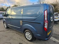 USED 2021 71 FORD TRANSIT CUSTOM Euro 6 hybrid Panel van, 51,864 miles, Automatic Gearbox, Sat Nav, Air Con, Alloys, Heated seats, and Front & Rear sensors. Final price + VAT @20% This 2021 Ford Transit Custom 340 Limited is a standout example, boasting a full service history and having had only one owner from new.  Powered by a 1.0 litre petrol plug in hybrid engine, this Euro 6 compliant model offers an efficient driving experience.  The Limited trim level ensures a well equipped vehicle, featuring Bi-Xenon headlights with LED daytime running lights for enhanced visibility.  Manoeuvring is made simpler with a rear view camera that includes trailer hitch assist, alongsid