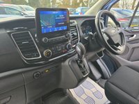 USED 2021 71 FORD TRANSIT CUSTOM Euro 6 hybrid Panel van, 51,864 miles, Automatic Gearbox, Sat Nav, Air Con, Alloys, Heated seats, and Front & Rear sensors. Final price + VAT @20% This 2021 Ford Transit Custom 340 Limited is a standout example, boasting a full service history and having had only one owner from new.  Powered by a 1.0 litre petrol plug in hybrid engine, this Euro 6 compliant model offers an efficient driving experience.  The Limited trim level ensures a well equipped vehicle, featuring Bi-Xenon headlights with LED daytime running lights for enhanced visibility.  Manoeuvring is made simpler with a rear view camera that includes trailer hitch assist, alongsid