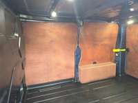 USED 2021 71 FORD TRANSIT CUSTOM Euro 6 hybrid Panel van, 51,864 miles, Automatic Gearbox, Sat Nav, Air Con, Alloys, Heated seats, and Front & Rear sensors. Final price + VAT @20% This 2021 Ford Transit Custom 340 Limited is a standout example, boasting a full service history and having had only one owner from new.  Powered by a 1.0 litre petrol plug in hybrid engine, this Euro 6 compliant model offers an efficient driving experience.  The Limited trim level ensures a well equipped vehicle, featuring Bi-Xenon headlights with LED daytime running lights for enhanced visibility.  Manoeuvring is made simpler with a rear view camera that includes trailer hitch assist, alongsid