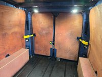 USED 2021 71 FORD TRANSIT CUSTOM Euro 6 hybrid Panel van, 51,864 miles, Automatic Gearbox, Sat Nav, Air Con, Alloys, Heated seats, and Front & Rear sensors. Final price + VAT @20% This 2021 Ford Transit Custom 340 Limited is a standout example, boasting a full service history and having had only one owner from new.  Powered by a 1.0 litre petrol plug in hybrid engine, this Euro 6 compliant model offers an efficient driving experience.  The Limited trim level ensures a well equipped vehicle, featuring Bi-Xenon headlights with LED daytime running lights for enhanced visibility.  Manoeuvring is made simpler with a rear view camera that includes trailer hitch assist, alongsid