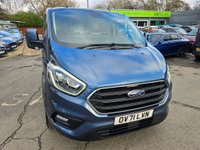 USED 2021 71 FORD TRANSIT CUSTOM Euro 6 hybrid Panel van, 51,864 miles, Automatic Gearbox, Sat Nav, Air Con, Alloys, Heated seats, and Front & Rear sensors. Final price + VAT @20% This 2021 Ford Transit Custom 340 Limited is a standout example, boasting a full service history and having had only one owner from new.  Powered by a 1.0 litre petrol plug in hybrid engine, this Euro 6 compliant model offers an efficient driving experience.  The Limited trim level ensures a well equipped vehicle, featuring Bi-Xenon headlights with LED daytime running lights for enhanced visibility.  Manoeuvring is made simpler with a rear view camera that includes trailer hitch assist, alongsid