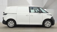 USED 2023 23 VOLKSWAGEN ID. Buzz Cargo Pro 77kWh Commerce Panel Van 5dr Electric Auto (204 ps) This 2023 Volkswagen ID. Buzz Cargo Pro Commerce offers a rare find with only one previous owner and a low mileage of 16,200 miles. As an electric vehicle, this 5-door automatic van is equipped with a 77kWh battery that provides a range of 254 miles when new. The interior is designed for comfort and convenience, featuring heated front seats and a 1-zone Climatronic system that includes an enhanced air filter and stationary air conditioning. Technology is well integrated, offering App Connect wit