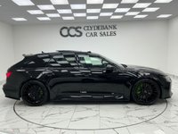 USED 2020 66 AUDI RS6 AVANT 4.0 TFSI V8 Carbon Black Estate 5dr Petrol Tiptronic quattro Euro 6 (s/s) (600 ps) Finished In Mythos Black, This RS6 Avant Comes With The Panoramic Glass Sunroof, Comfort And Sound Package, 22" Alloy Wheels With RS Brake Callipers In Green, RS Puddle Lamps, Bang And Olufsen Premium 3D Sound System, Memory Seats, Heated Front Seats, Reverse And 360 Degree Camera With Top View, RS Embossed Stitching Front And Rear, Privacy Glass, Powered Tailgate, Service History, 12 Months MOT, 3 Months Warranty. Finance And Extended Warranty Available.