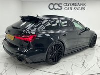 USED 2020 66 AUDI RS6 AVANT 4.0 TFSI V8 Carbon Black Estate 5dr Petrol Tiptronic quattro Euro 6 (s/s) (600 ps) Finished In Mythos Black, This RS6 Avant Comes With The Panoramic Glass Sunroof, Comfort And Sound Package, 22" Alloy Wheels With RS Brake Callipers In Green, RS Puddle Lamps, Bang And Olufsen Premium 3D Sound System, Memory Seats, Heated Front Seats, Reverse And 360 Degree Camera With Top View, RS Embossed Stitching Front And Rear, Privacy Glass, Powered Tailgate, Service History, 12 Months MOT, 3 Months Warranty. Finance And Extended Warranty Available.