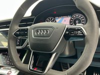 USED 2020 66 AUDI RS6 AVANT 4.0 TFSI V8 Carbon Black Estate 5dr Petrol Tiptronic quattro Euro 6 (s/s) (600 ps) Finished In Mythos Black, This RS6 Avant Comes With The Panoramic Glass Sunroof, Comfort And Sound Package, 22" Alloy Wheels With RS Brake Callipers In Green, RS Puddle Lamps, Bang And Olufsen Premium 3D Sound System, Memory Seats, Heated Front Seats, Reverse And 360 Degree Camera With Top View, RS Embossed Stitching Front And Rear, Privacy Glass, Powered Tailgate, Service History, 12 Months MOT, 3 Months Warranty. Finance And Extended Warranty Available.