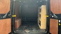 USED 2021 71 FORD TRANSIT CUSTOM Black 2.0 300 EcoBlue Limited L2 van, 26,700 miles, Rear seats & windows Conversion, Euro 6, 6-Speed manual, A/C, alloys, F&R sensors. Plus VAT @ 20%! This 2021 Ford Transit Custom 300 Limited has been maintained by only one owner and has covered just 26,700 miles. This 2.0 litre diesel van is a Limited trim model, featuring the Euro 6 emission standard and an MOT valid until October 2026. Inside, the cabin is equipped with front manual air conditioning and the ICE Feature Pack 21, which includes Bluetooth connectivity for your devices. The vehicle also comes with the Visibility Pack High, providing automatic headlights with a follow me home f