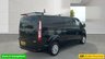 USED 2021 71 FORD TRANSIT CUSTOM Black 2.0 300 EcoBlue Limited L2 van, 26,700 miles, Rear seats & windows Conversion, Euro 6, 6-Speed manual, A/C, alloys, F&R sensors. Plus VAT @ 20%! This 2021 Ford Transit Custom 300 Limited has been maintained by only one owner and has covered just 26,700 miles. This 2.0 litre diesel van is a Limited trim model, featuring the Euro 6 emission standard and an MOT valid until October 2026. Inside, the cabin is equipped with front manual air conditioning and the ICE Feature Pack 21, which includes Bluetooth connectivity for your devices. The vehicle also comes with the Visibility Pack High, providing automatic headlights with a follow me home f