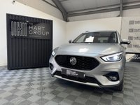 USED 2023 23 MG MG ZS 1.0 T-GDI Exclusive SUV 5dr Petrol Auto Euro 6 (111 ps) Top-spec MG ZS Exclusive finished in Silver with automatic transmission, panoramic sky roof, heated leather-style seats, satellite navigation, Apple CarPlay & Android Auto, reversing camera, rear parking sensors, keyless entry, and alloy wheels. A spacious, economical SUV that&rsquo;s perfect for family life or everyday driving.