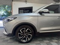 USED 2023 23 MG MG ZS 1.0 T-GDI Exclusive SUV 5dr Petrol Auto Euro 6 (111 ps) Top-spec MG ZS Exclusive finished in Silver with automatic transmission, panoramic sky roof, heated leather-style seats, satellite navigation, Apple CarPlay & Android Auto, reversing camera, rear parking sensors, keyless entry, and alloy wheels. A spacious, economical SUV that&rsquo;s perfect for family life or everyday driving.