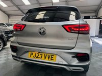 USED 2023 23 MG MG ZS 1.0 T-GDI Exclusive SUV 5dr Petrol Auto Euro 6 (111 ps) Top-spec MG ZS Exclusive finished in Silver with automatic transmission, panoramic sky roof, heated leather-style seats, satellite navigation, Apple CarPlay & Android Auto, reversing camera, rear parking sensors, keyless entry, and alloy wheels. A spacious, economical SUV that&rsquo;s perfect for family life or everyday driving.