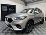 USED 2023 23 MG MG ZS 1.0 T-GDI Exclusive SUV 5dr Petrol Auto Euro 6 (111 ps) Top-spec MG ZS Exclusive finished in Silver with automatic transmission, panoramic sky roof, heated leather-style seats, satellite navigation, Apple CarPlay & Android Auto, reversing camera, rear parking sensors, keyless entry, and alloy wheels. A spacious, economical SUV that&rsquo;s perfect for family life or everyday driving.