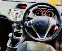 USED 2009 58 FORD FIESTA 1.25 Zetec Hatchback 5dr Petrol Manual (133 g/km, 81 bhp) Clean and well-presented Ford Fiesta 1.25 Zetec finished in Electric Blue Metallic. Reliable and economical 1.25 petrol engine &ndash; not to be confused with the later 1.0 EcoBoost. Great first car with 15" alloy wheels, air conditioning, QuickClear heated windscreen, AUX, electric windows and heated mirrors. Supplied with a full service, new 12-month MOT, 3-month warranty and the option to upgrade to an 18-month nationwide Gold Cover warranty for just &pound;199.