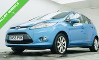 USED 2009 58 FORD FIESTA 1.25 Zetec Hatchback 5dr Petrol Manual (133 g/km, 81 bhp) Clean and well-presented Ford Fiesta 1.25 Zetec finished in Electric Blue Metallic. Reliable and economical 1.25 petrol engine &ndash; not to be confused with the later 1.0 EcoBoost. Great first car with 15" alloy wheels, air conditioning, QuickClear heated windscreen, AUX, electric windows and heated mirrors. Supplied with a full service, new 12-month MOT, 3-month warranty and the option to upgrade to an 18-month nationwide Gold Cover warranty for just &pound;199.