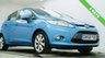 USED 2009 58 FORD FIESTA 1.25 Zetec Hatchback 5dr Petrol Manual (133 g/km, 81 bhp) Clean and well-presented Ford Fiesta 1.25 Zetec finished in Electric Blue Metallic. Reliable and economical 1.25 petrol engine &ndash; not to be confused with the later 1.0 EcoBoost. Great first car with 15" alloy wheels, air conditioning, QuickClear heated windscreen, AUX, electric windows and heated mirrors. Supplied with a full service, new 12-month MOT, 3-month warranty and the option to upgrade to an 18-month nationwide Gold Cover warranty for just &pound;199.