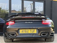 USED 2012 62 PORSCHE 911 3.8 997 Turbo Cabriolet 2dr Petrol PDK AWD (268 g/km, 500 bhp) PORSCHE 911 3.8 997 TURBO S CABRIOLET + PDK 7 SPEED AUTOMATIC + GREAT SPECIFICATION + HEATED ELECTRIC BLACK LEATHER SPORTS SEATS + ADJUSTABLE SPOILER + HEADLIGHT WASHERS + ADAPTIVE SPORTS SUSPENSION + LOW MILES + RADIO & CD PLAYER + BLUETOOTH TELEPHONE + CIGARETTE LIGHTER + ELECTRICALLY OPERATED SOFT TOP CONVERTIBLE ROOF + SATNAV + CUPHOLDERS + MUCH MORE...   12 MONTHS MOT + 6 MONTHS WARRANTY + PART EXCHANGE WELCOME + NATIONWIDE DELIVERY AVAILABLE