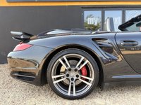 USED 2012 62 PORSCHE 911 3.8 997 Turbo Cabriolet 2dr Petrol PDK AWD (268 g/km, 500 bhp) PORSCHE 911 3.8 997 TURBO S CABRIOLET + PDK 7 SPEED AUTOMATIC + GREAT SPECIFICATION + HEATED ELECTRIC BLACK LEATHER SPORTS SEATS + ADJUSTABLE SPOILER + HEADLIGHT WASHERS + ADAPTIVE SPORTS SUSPENSION + LOW MILES + RADIO & CD PLAYER + BLUETOOTH TELEPHONE + CIGARETTE LIGHTER + ELECTRICALLY OPERATED SOFT TOP CONVERTIBLE ROOF + SATNAV + CUPHOLDERS + MUCH MORE...   12 MONTHS MOT + 6 MONTHS WARRANTY + PART EXCHANGE WELCOME + NATIONWIDE DELIVERY AVAILABLE