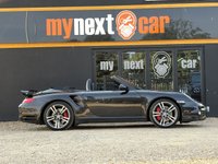USED 2012 62 PORSCHE 911 3.8 997 Turbo Cabriolet 2dr Petrol PDK AWD (268 g/km, 500 bhp) PORSCHE 911 3.8 997 TURBO S CABRIOLET + PDK 7 SPEED AUTOMATIC + GREAT SPECIFICATION + HEATED ELECTRIC BLACK LEATHER SPORTS SEATS + ADJUSTABLE SPOILER + HEADLIGHT WASHERS + ADAPTIVE SPORTS SUSPENSION + LOW MILES + RADIO & CD PLAYER + BLUETOOTH TELEPHONE + CIGARETTE LIGHTER + ELECTRICALLY OPERATED SOFT TOP CONVERTIBLE ROOF + SATNAV + CUPHOLDERS + MUCH MORE...   12 MONTHS MOT + 6 MONTHS WARRANTY + PART EXCHANGE WELCOME + NATIONWIDE DELIVERY AVAILABLE