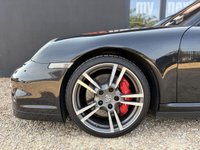 USED 2012 62 PORSCHE 911 3.8 997 Turbo Cabriolet 2dr Petrol PDK AWD (268 g/km, 500 bhp) PORSCHE 911 3.8 997 TURBO S CABRIOLET + PDK 7 SPEED AUTOMATIC + GREAT SPECIFICATION + HEATED ELECTRIC BLACK LEATHER SPORTS SEATS + ADJUSTABLE SPOILER + HEADLIGHT WASHERS + ADAPTIVE SPORTS SUSPENSION + LOW MILES + RADIO & CD PLAYER + BLUETOOTH TELEPHONE + CIGARETTE LIGHTER + ELECTRICALLY OPERATED SOFT TOP CONVERTIBLE ROOF + SATNAV + CUPHOLDERS + MUCH MORE...   12 MONTHS MOT + 6 MONTHS WARRANTY + PART EXCHANGE WELCOME + NATIONWIDE DELIVERY AVAILABLE