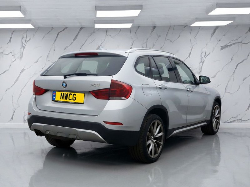 2013 BMW X1 in silver — photo 4 of 12