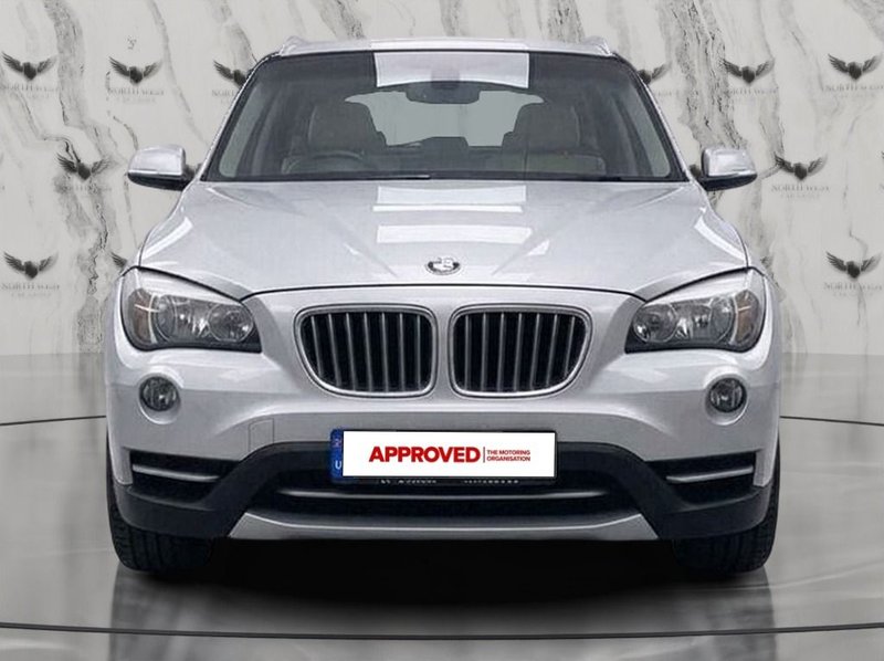 2013 BMW X1 in silver — photo 2 of 14