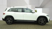 USED 2023 23 MERCEDES-BENZ EQB White EQB 300 AMG Line, 29,650 miles, Electric 4MATIC, 7 seats, Sat nav, Rear camera, Heated front seats, Part leather, ULEZ compliant. This 2023 Mercedes-Benz EQB 300 AMG Line is a well-maintained vehicle that has had only one owner from new. As an all-electric SUV with four-wheel drive, this AMG Line model offers a practical solution for families, featuring seven seats and a spacious boot. The vehicle is equipped with a 73 kWh battery that provides a range of 253 miles when new, and it comes with an MOT valid until June 2027. Comfort and safety are prioritised through features such as heated front seats, THERMOTRONIC automatic