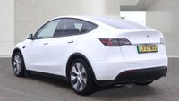 USED 2023 23 TESLA MODEL Y White Dual Motor Long Range SUV, 66,808 miles, Electric 4WD, Leather, Heated seats, Glass roof, Sat nav, Rear camera, Climate control. This 2023 Tesla Model Y Long Range has been kept in excellent condition by its only owner and comes with an MOT valid until March 2027. As an all-electric vehicle with a four-wheel drive system, this model is designed for efficiency and capability. Inside, the cabin is equipped with dual zone climate control and a heated steering wheel for comfort, while passengers in the back benefit from heated seats. The interior experience is enhanced by an expansive glass roof that offers ultraviolet and in